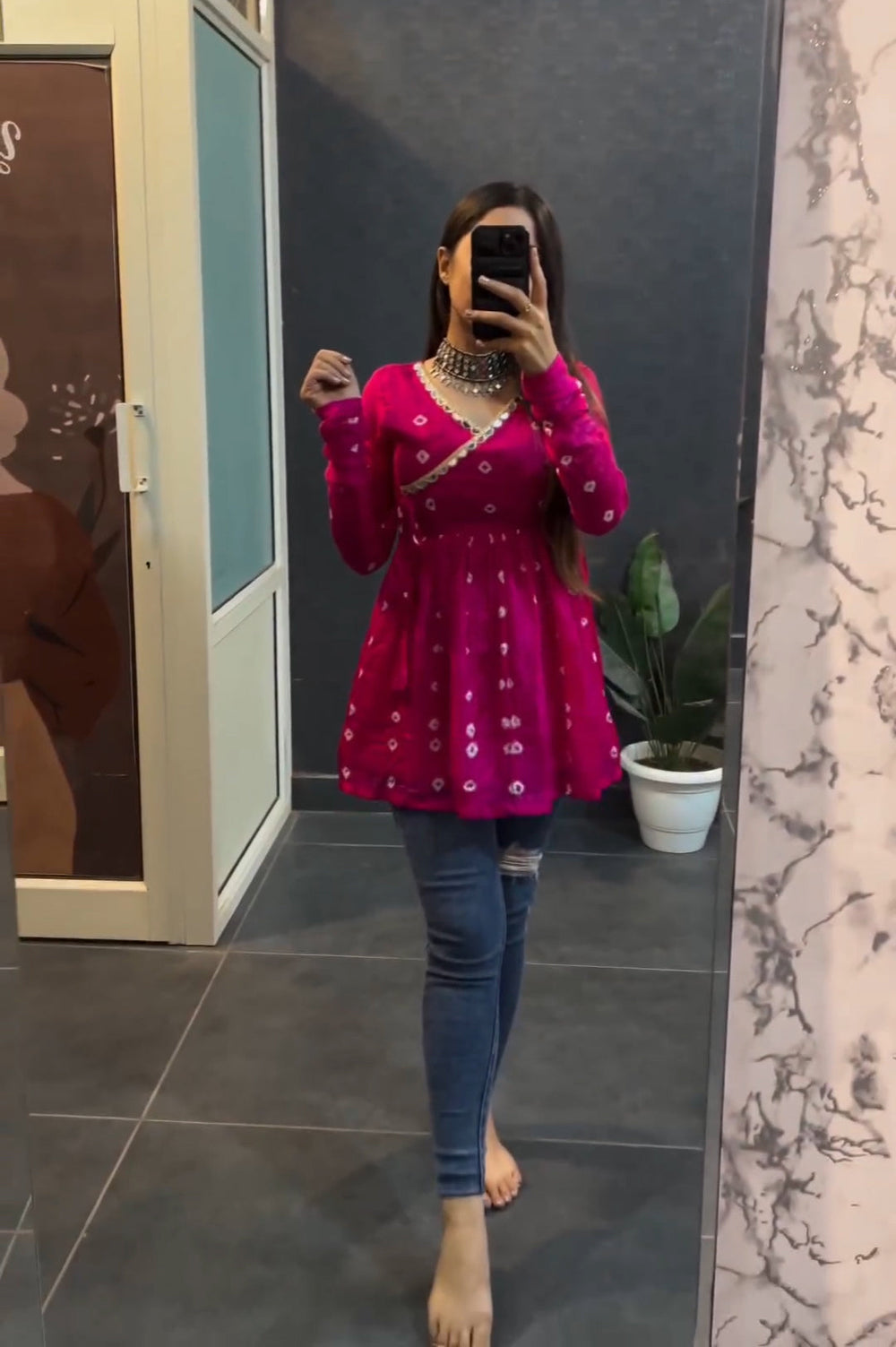 Pink bandhni print flared short kurti - front view