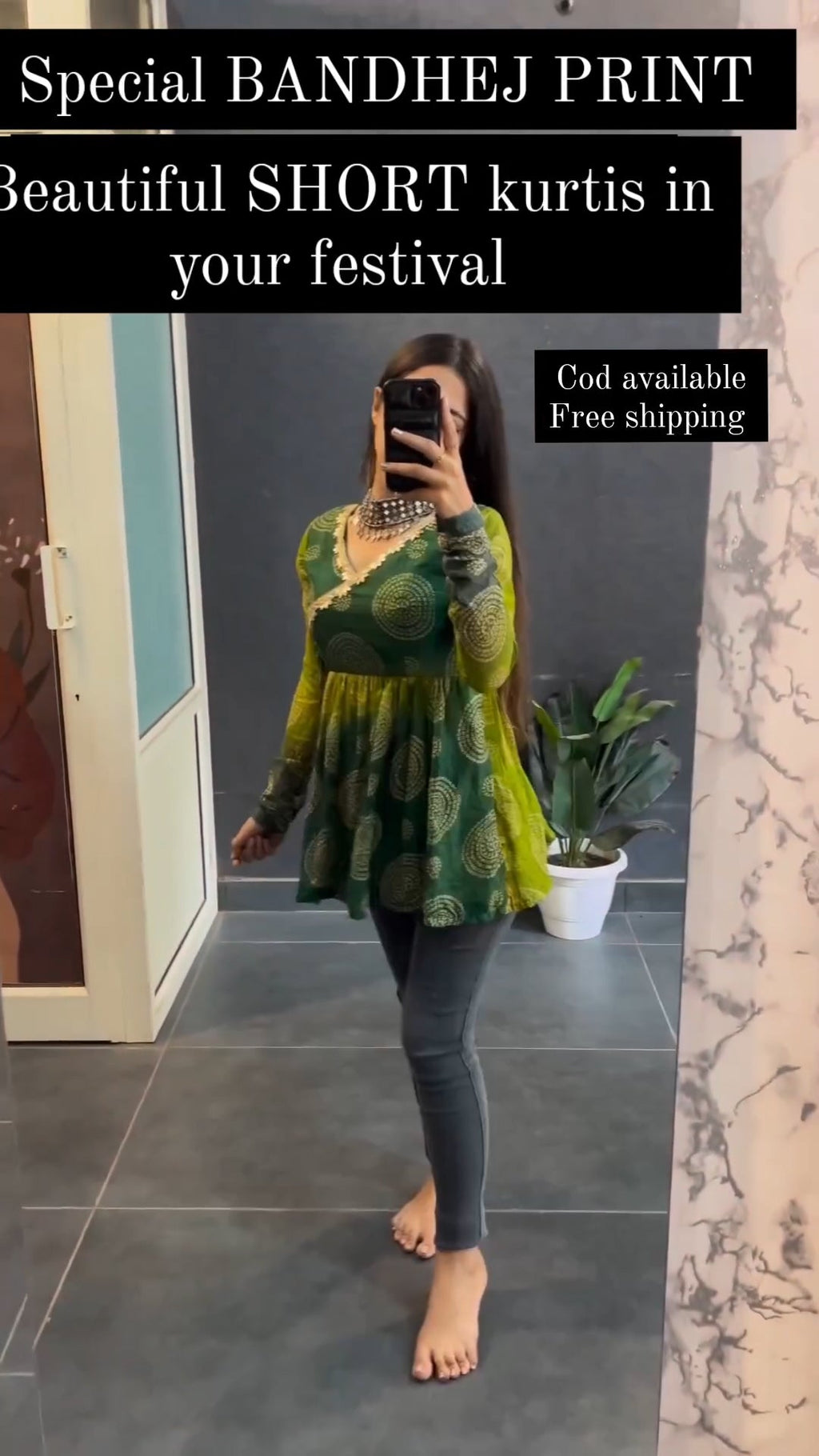Green bandhej print short kurti - front view
