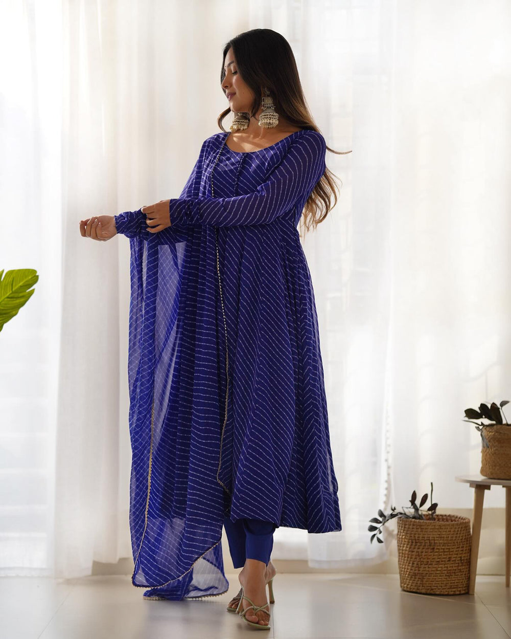 Royal blue striped Anarkali suit with trousers and dupatta, model front view