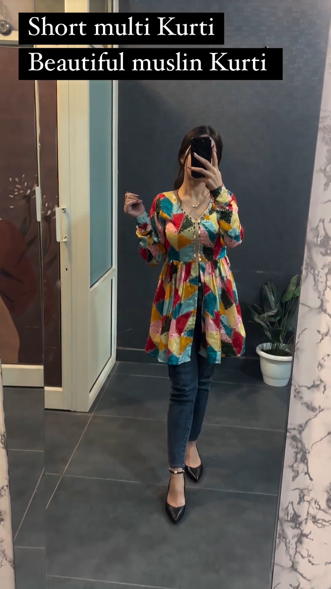Woman wearing multi print flared kurti with leggings