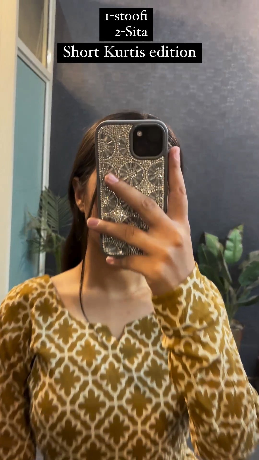 Woman wearing mustard printed short kurti